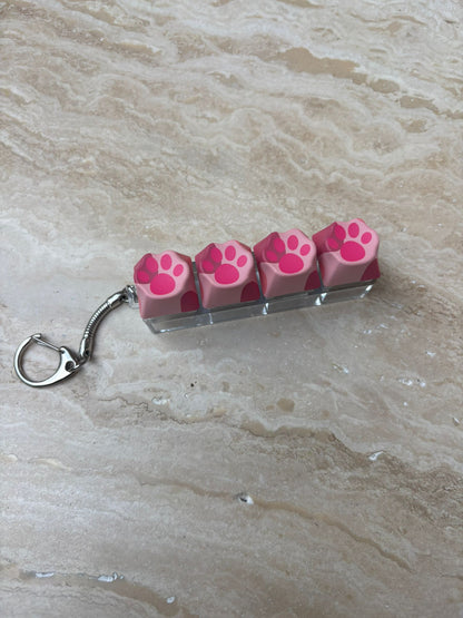Klikker roze kattenpoot