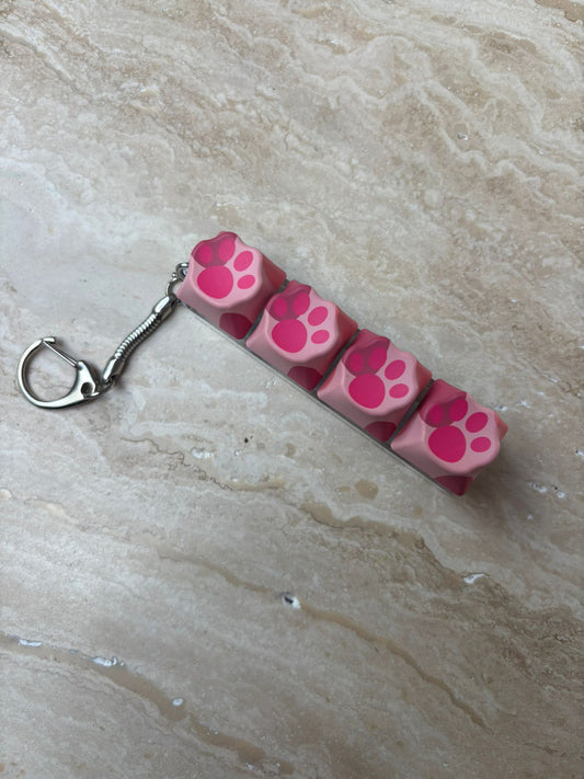 Klikker roze kattenpoot