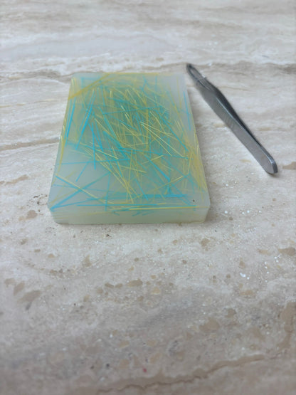 Haarplukmat met pincet geel blauw
